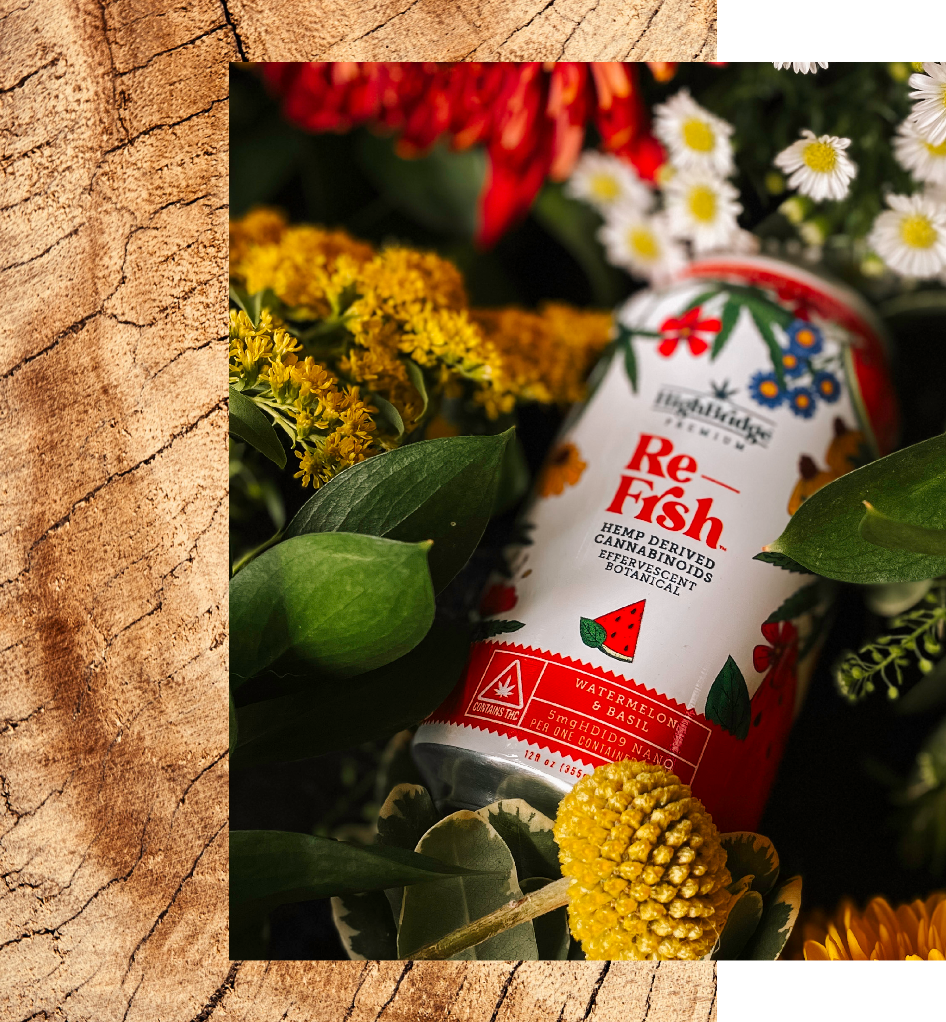 A can of HighBridge Premium's effervescent botanical, ReFrsh, surrounded by fall flowers